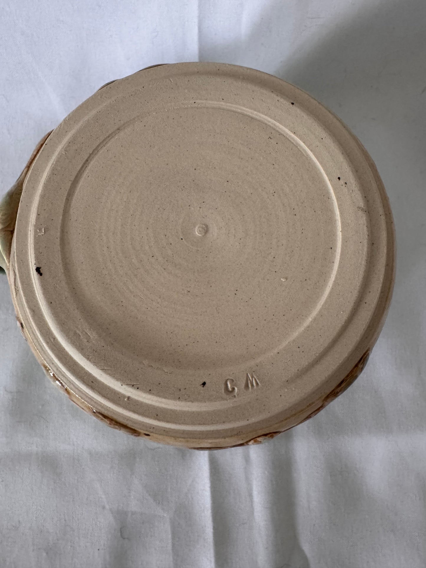 A rounded bottom mug (greens/ creams)