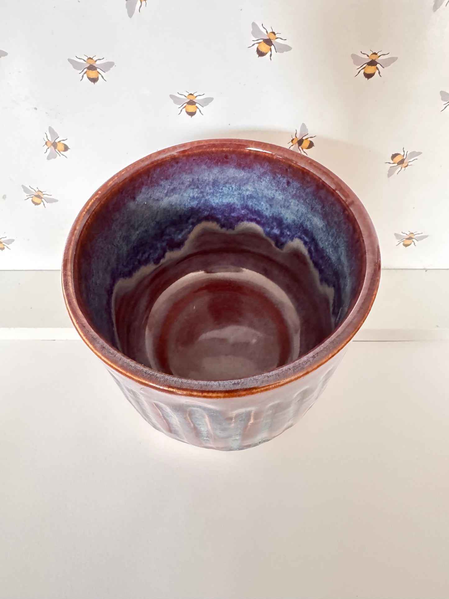 A coffee beaker (purples & blues)