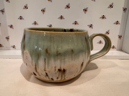 A mug (greens/ creams)