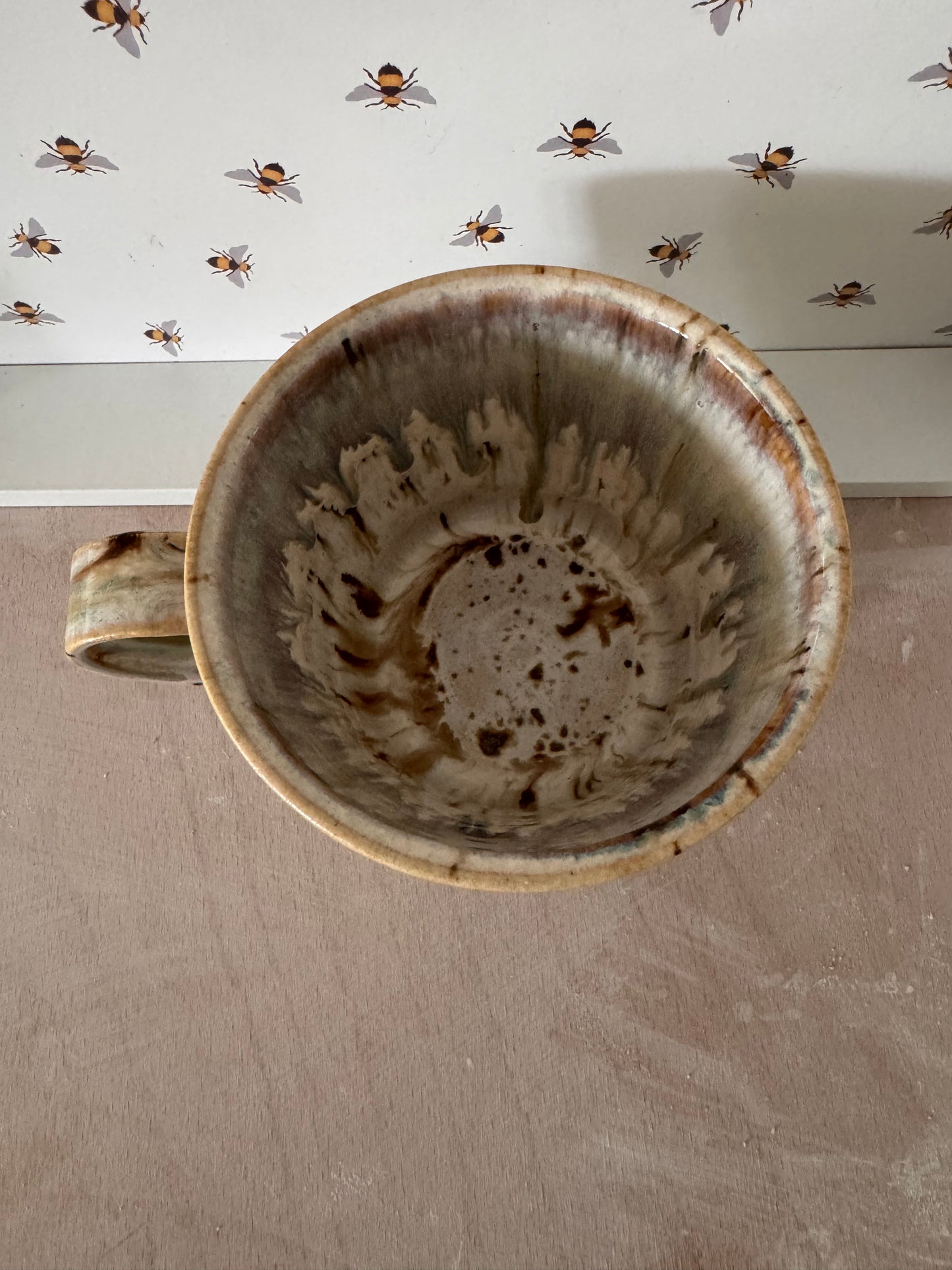 A mug (cream with bluey-purples)