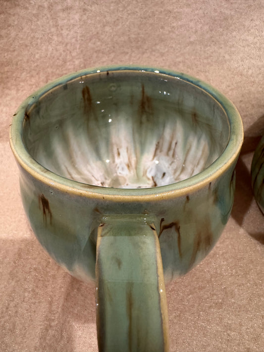 A rounded bottom mug (greens/ creams)