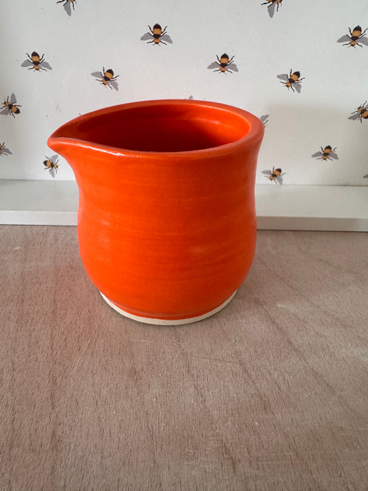 A little pourer (bright orange)