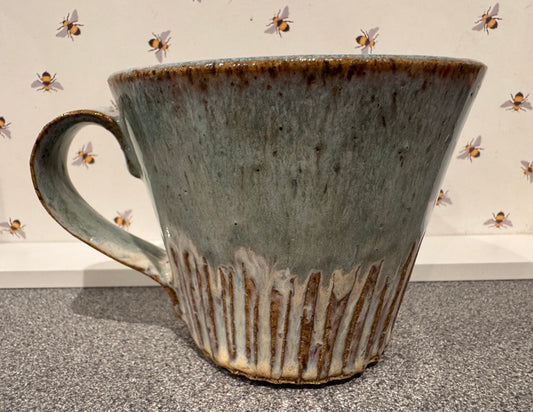 A mug (blues & browns, speckled clay)