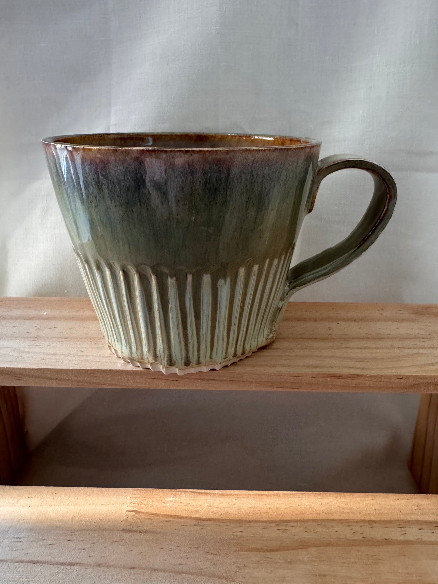 A fluted mug (light greens)