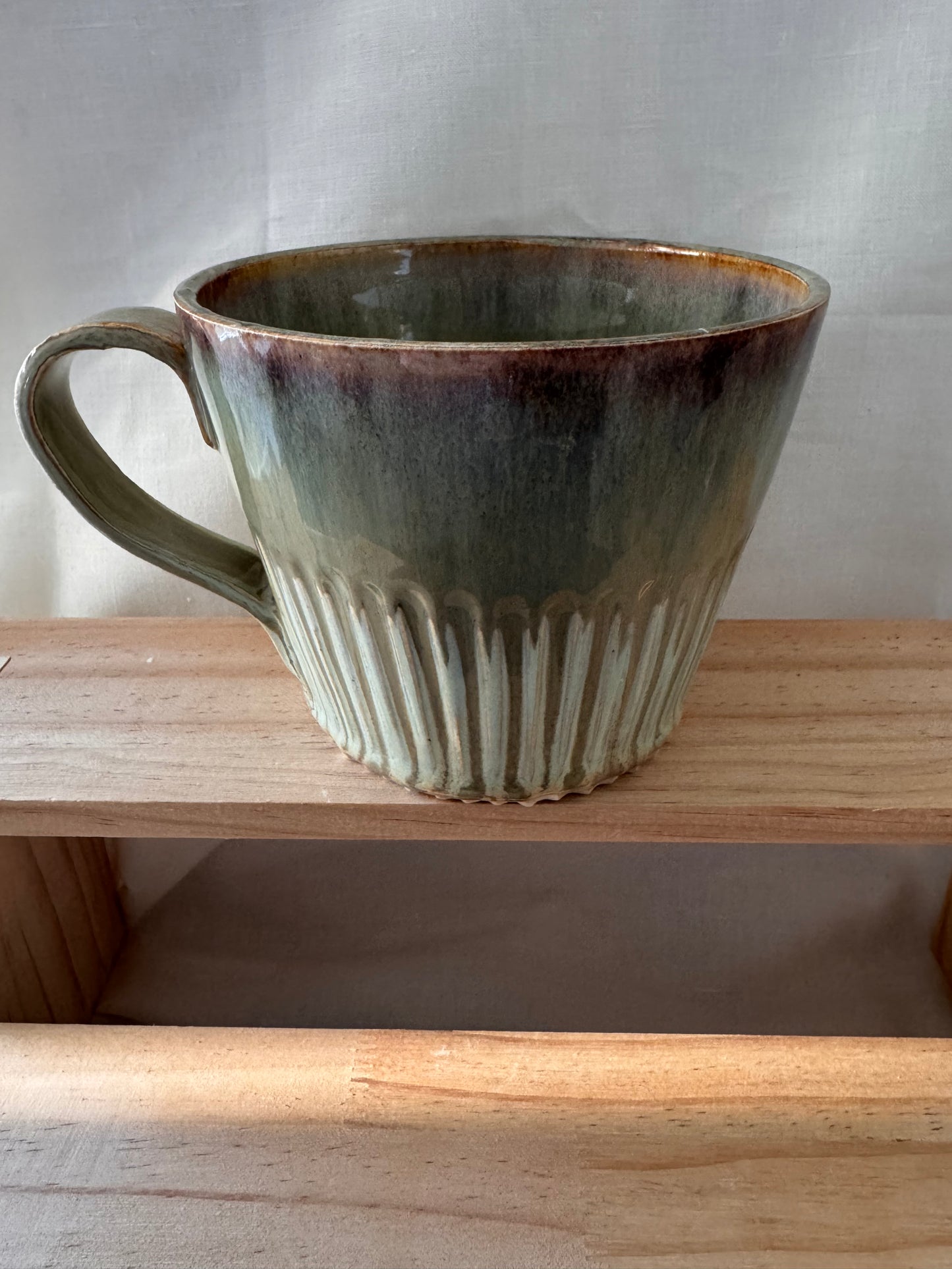 A fluted mug (light greens)