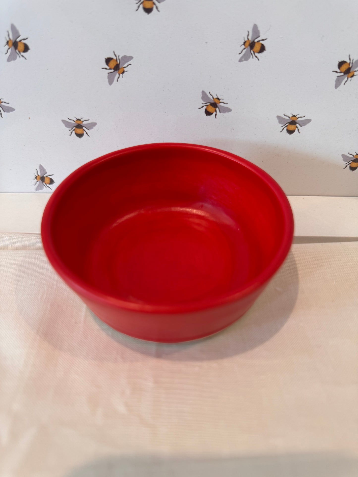 Candle dish (bold red) with large candle